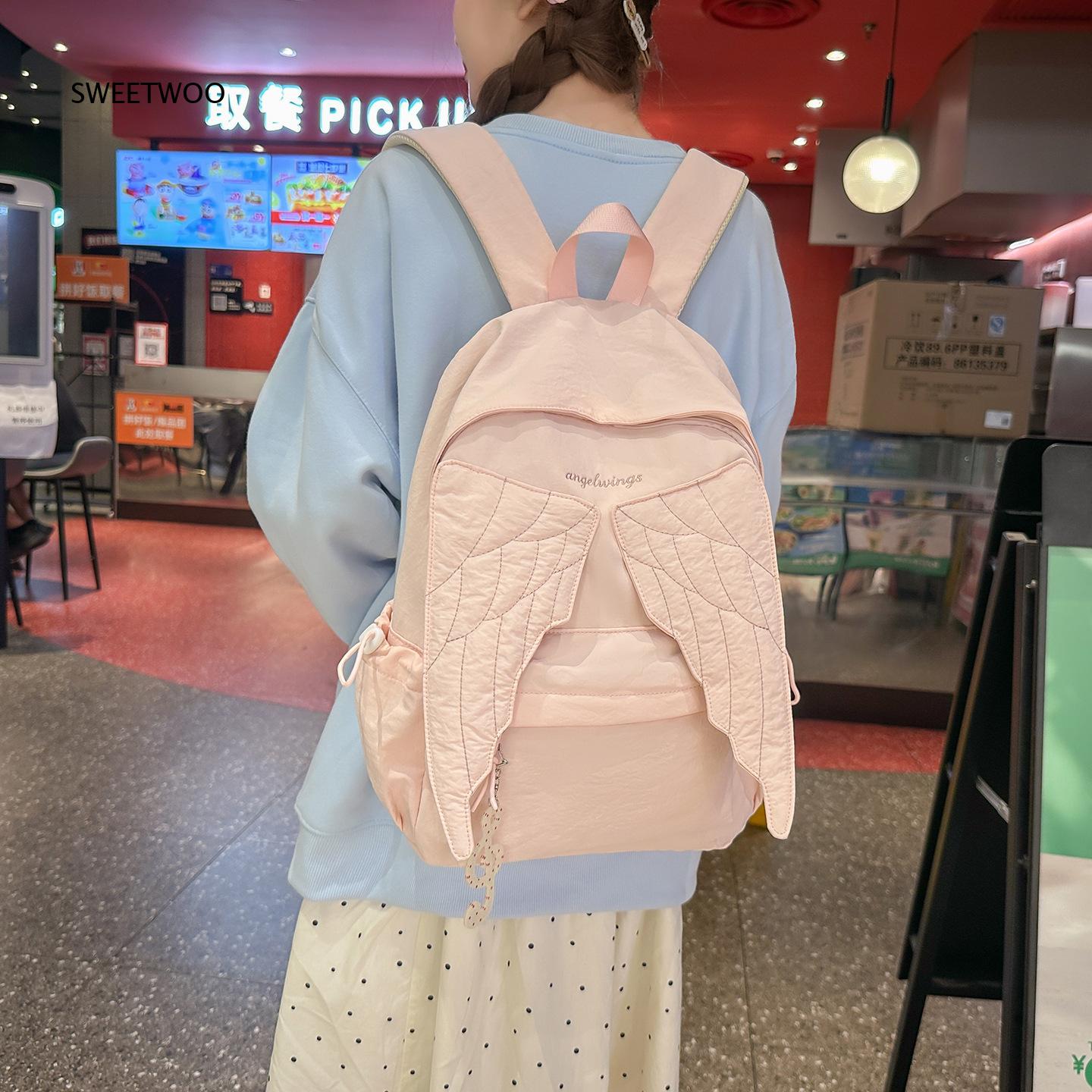 女性用ピンクエンジェルウィングリュックサック、キルト加工の翼 - Embroidery And Quilting のレビューと価格